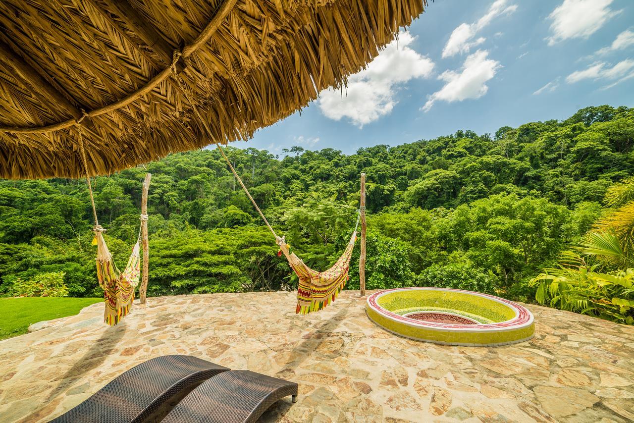 One Santuario Hotel Y Reserva Natural Palomino Exterior photo